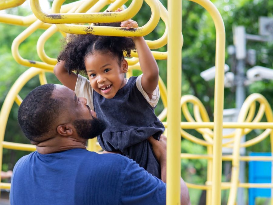 Father and daughter playing