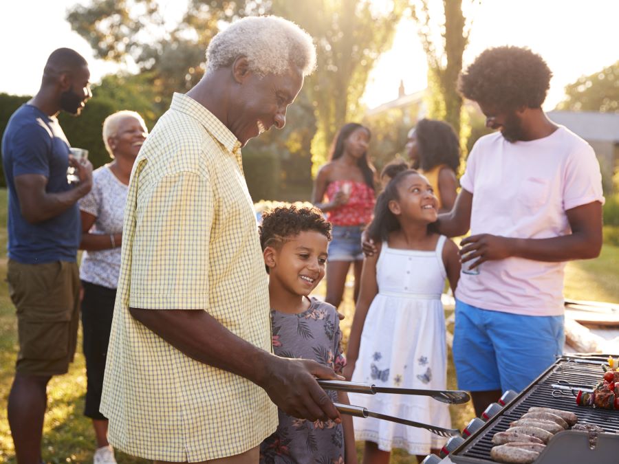 Family at an outside BBQ