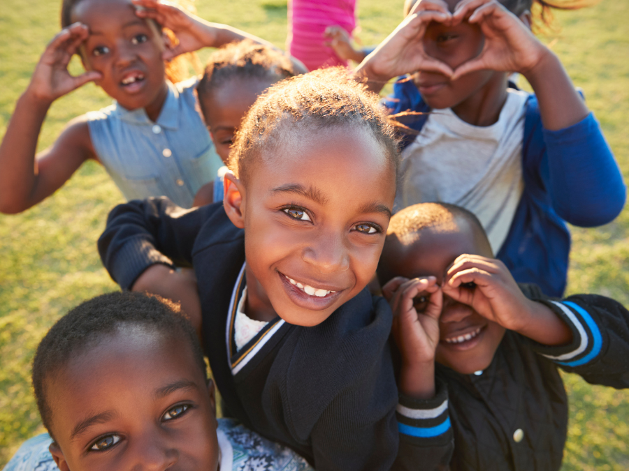 Group youths playing outside.